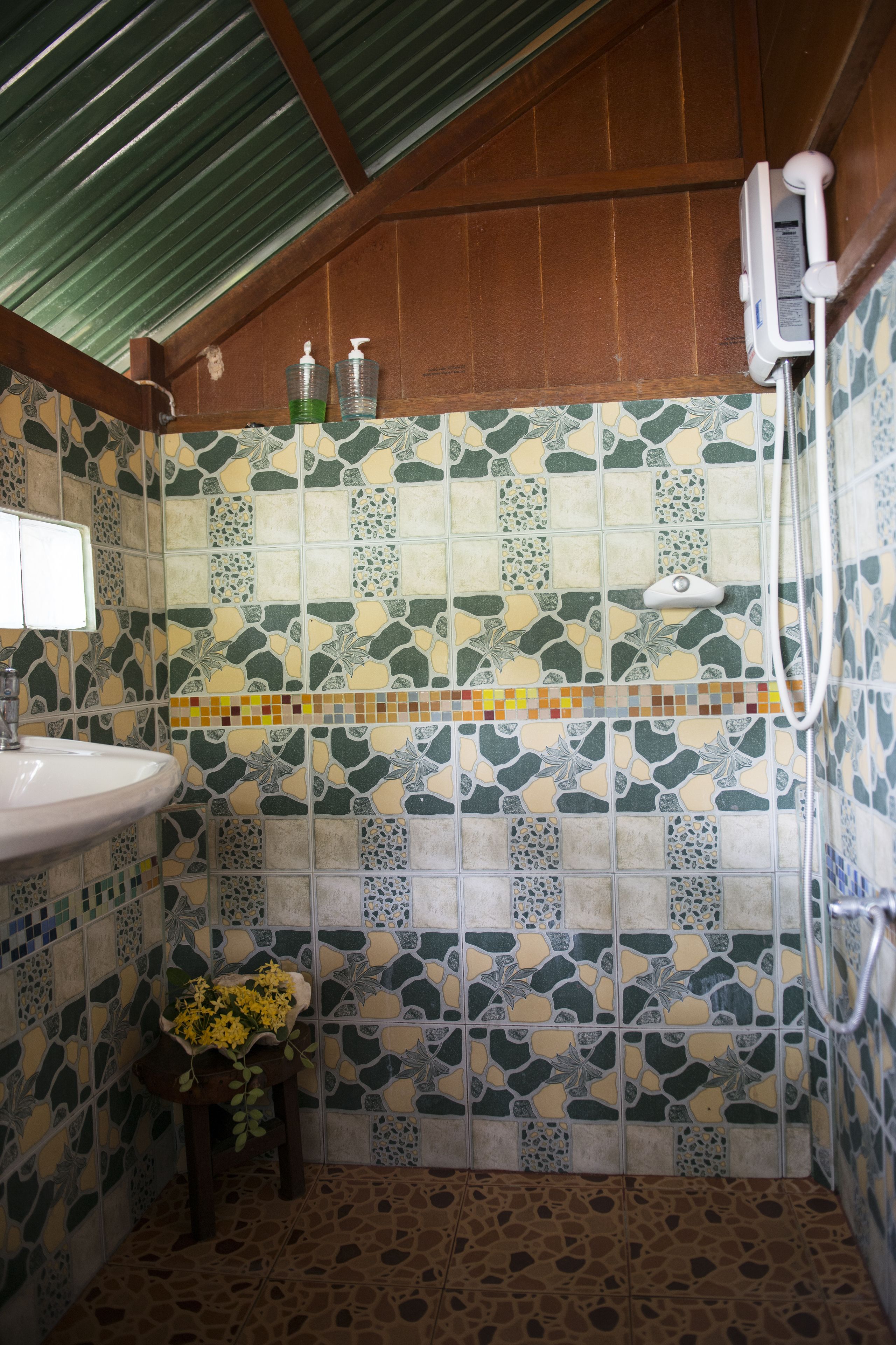 seafront bungalow | bathroom | shower, free toiletries, towels