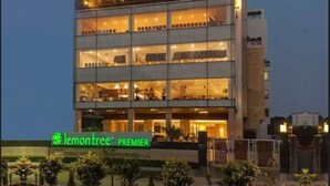 A multi-story building with a prominent sign reading "lemon tree PREMIER". - Lemon Tree Premier Patna (Patna)