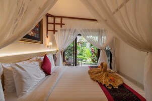 Deluxe Double Room, 1 Bedroom, Pool View, Ground Floor | Minibar, in-room safe, desk, free WiFi