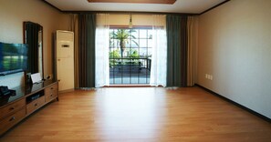 Family Room, 2 Bedrooms, Ocean View (82 sqm.) | Living area | Flat-screen TV - Hodo House (Seogwipo)