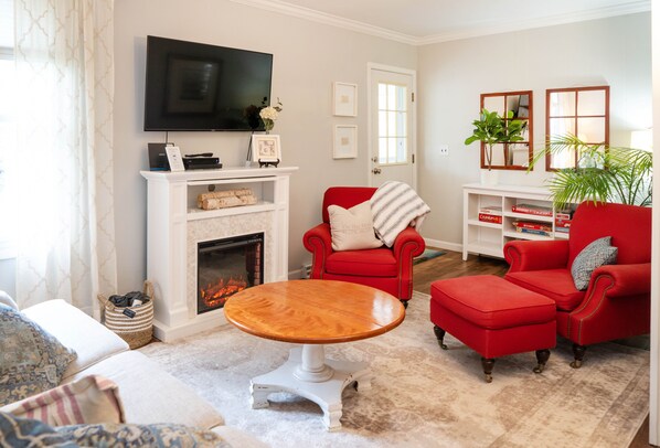 Smart TV, fireplace, DVD player, books