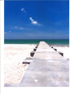 Plage à proximité, chaise longue, serviettes de plage