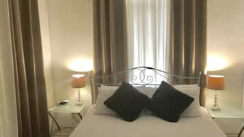 Apartemen Standar, 2 kamar tidur | 2 kamar tidur, seprai premium, setrika/meja setrika, dan seprai linen