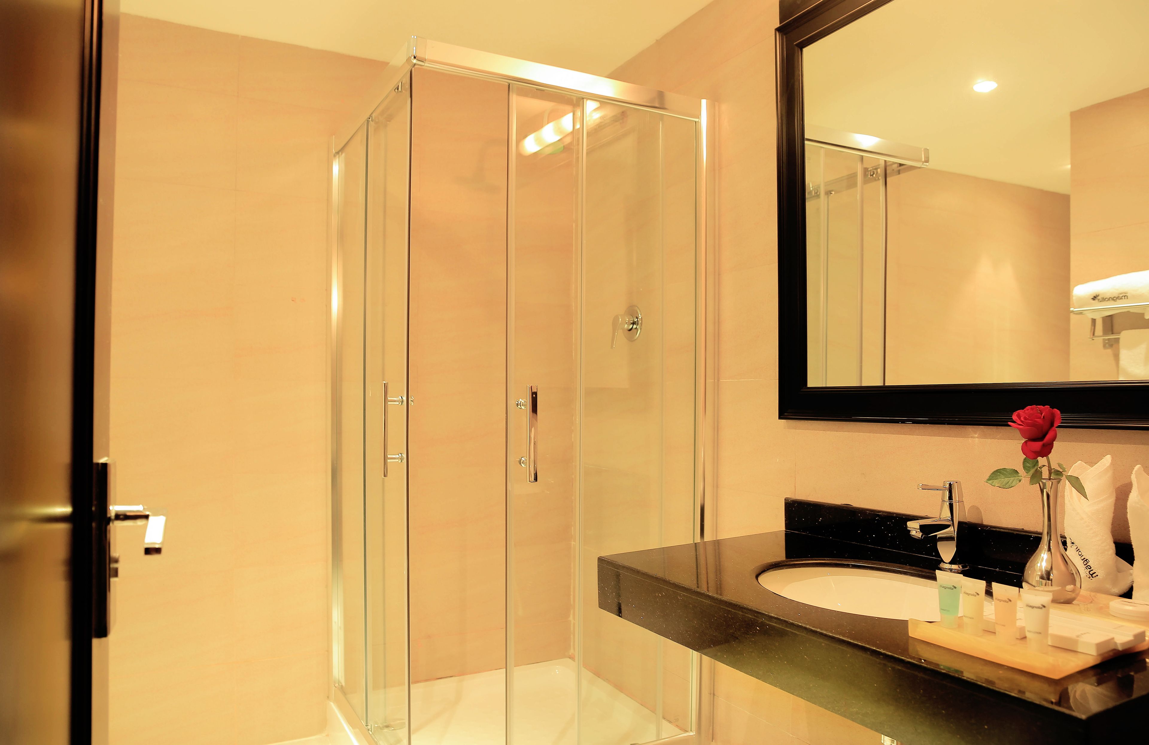 spring water bathtub, rainfall showerhead, free toiletries, hair dryer