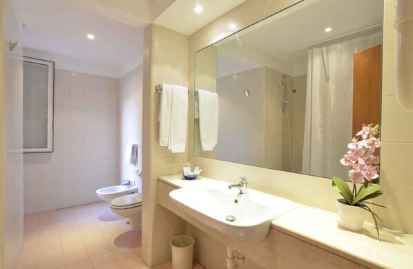 Free toiletries, hair dryer, bidet, towels