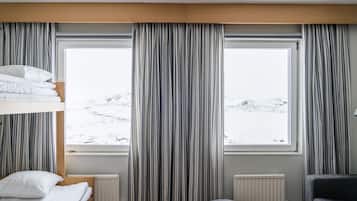 Basic Quadruple Room | 1 bedroom, blackout curtains, free WiFi, bed sheets