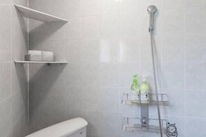 Shower, free toiletries, hair dryer, slippers