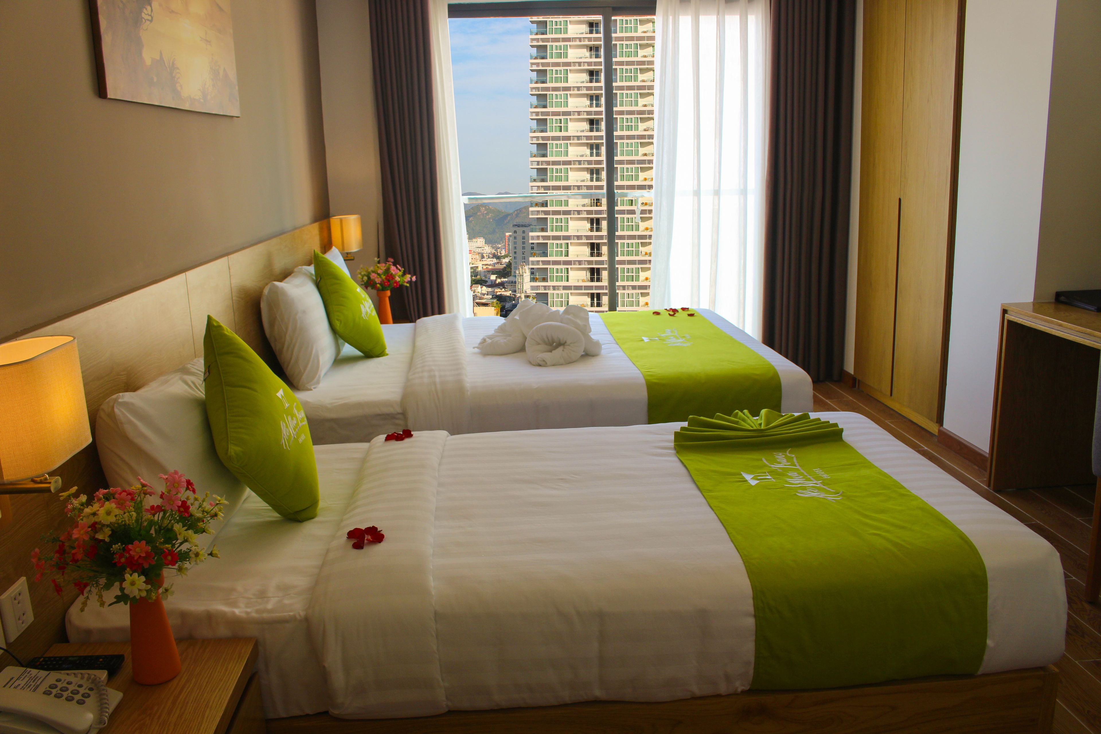 executive room, balcony, city view | living area | lcd tv