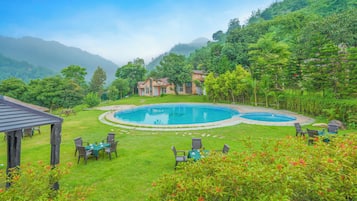 Indoor pool, outdoor pool, open 8:00 AM to 8:00 PM, pool umbrellas