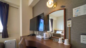 Desk, iron/ironing board, free WiFi, bed sheets