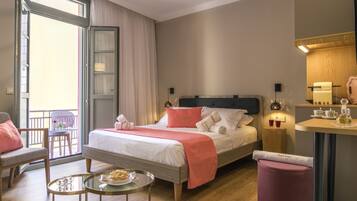 Deluxe Quadruple Room, 1 Queen Bed, Balcony | Minibar, in-room safe, desk, blackout drapes