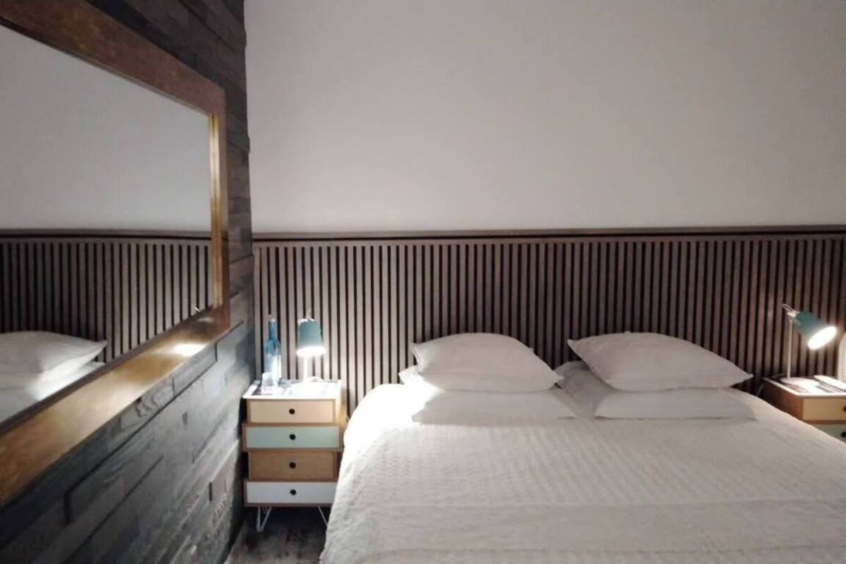 Suite Deluxe (Sud) | 1 camera, biancheria da letto di alta qualità, tende oscuranti