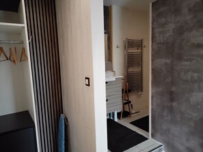 Design Suite (Est) | Bathroom | Hair dryer, towels, soap, toilet paper