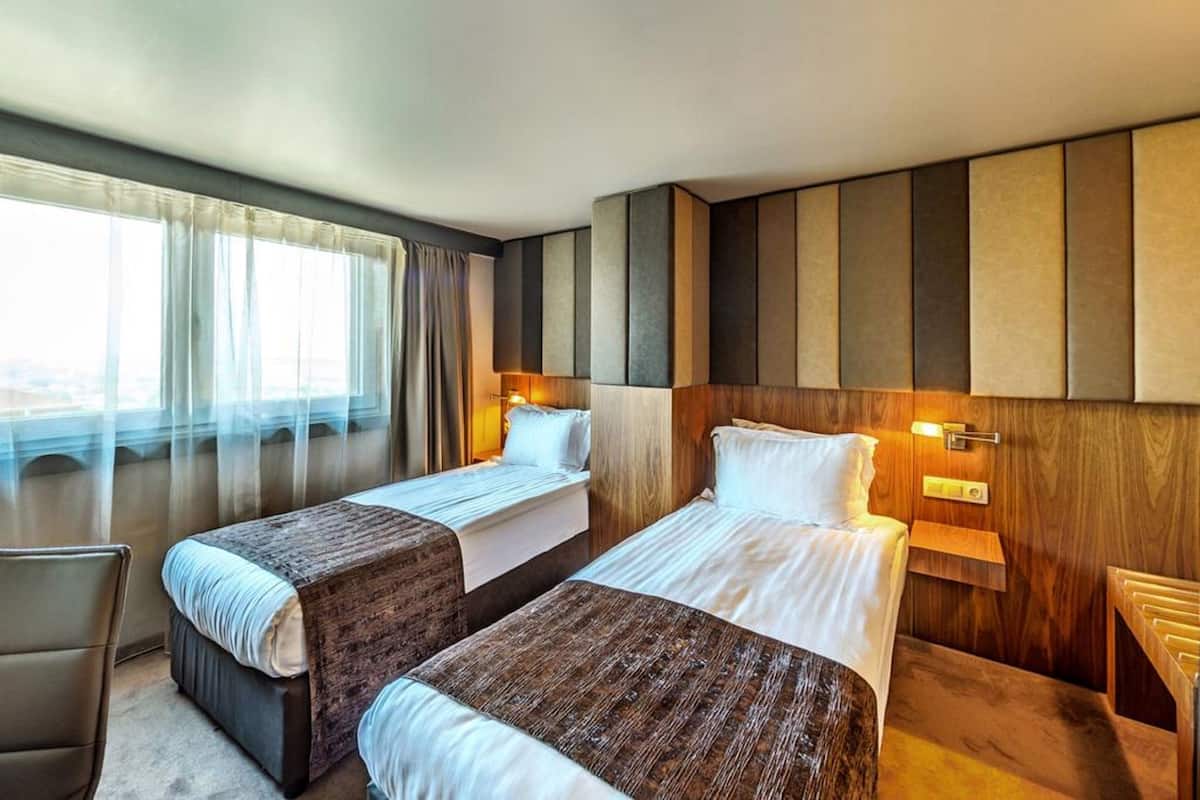 Klassieke Twin kamer, 2 eenpersoonsbedden | 1 slaapkamer, luxe beddengoed, bedden met traagschuimmatras, een minibar