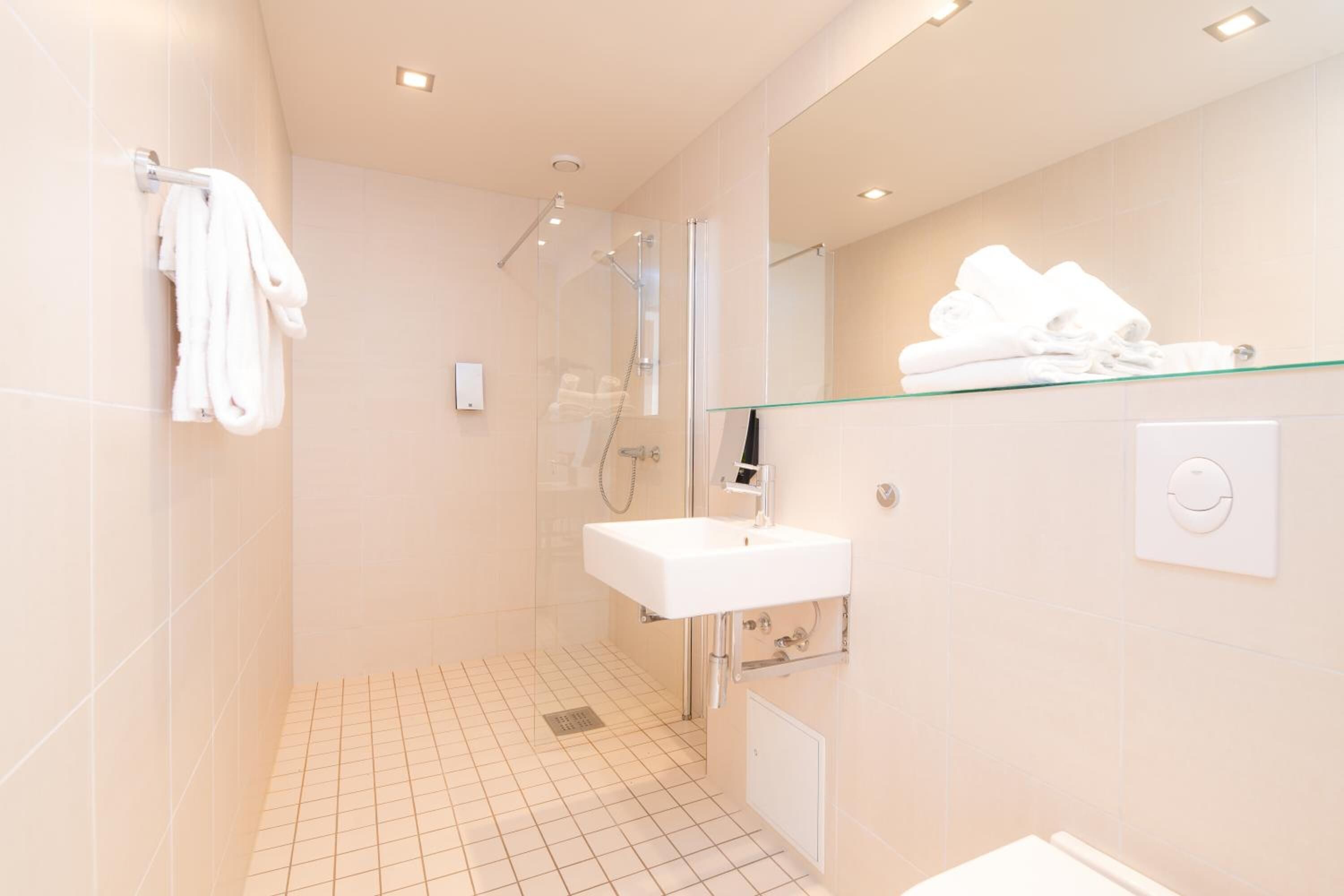 double room (ground floor) | bathroom | shower, hair dryer, towels, soap