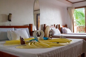 Family Room with Balcony, 2nd Floor | Minibar, in-room safe, individually furnished, iron/ironing board