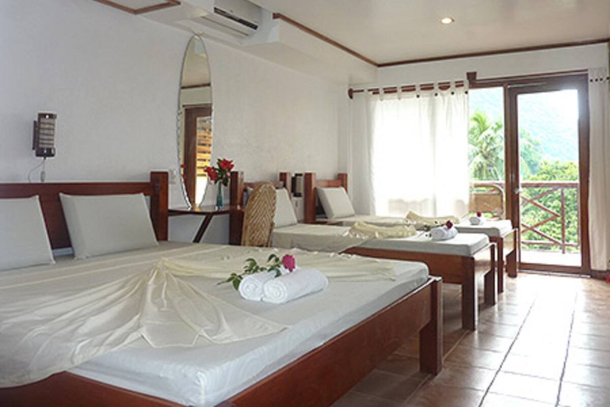 Camera familiare, balcone (2nd Floor) | Minibar, una cassaforte in camera, ferro/asse da stiro, Wi-Fi gratuito
