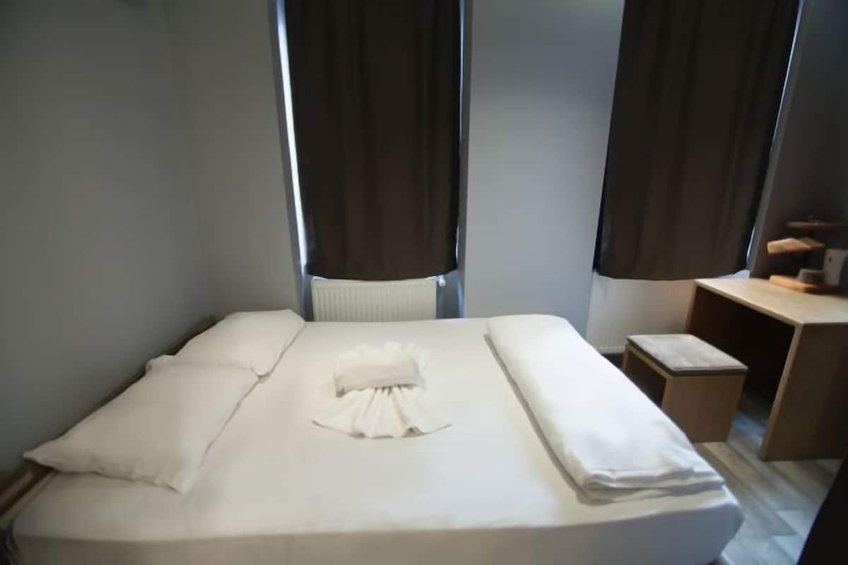 Blackout curtains, soundproofing, free WiFi, bed sheets