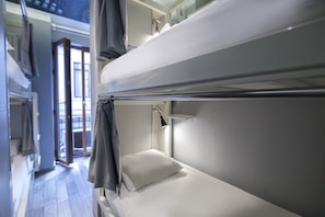 Blackout drapes, soundproofing, free WiFi, bed sheets
