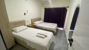 Apartamento, 1 quarto | Ferros/tábuas de passar roupa, Wi-Fi de cortesia, roupa de cama