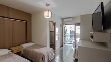 Minibar, cortinas opacas, tabla de planchar con plancha y wifi gratis