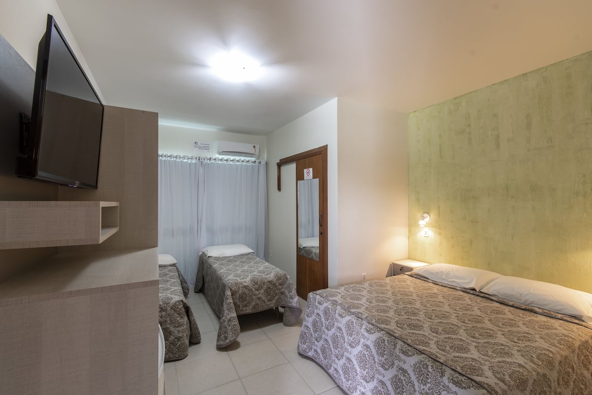Chambre Classique | Minibar, rideaux occultants, fer et planche à repasser, Wi-Fi gratuit