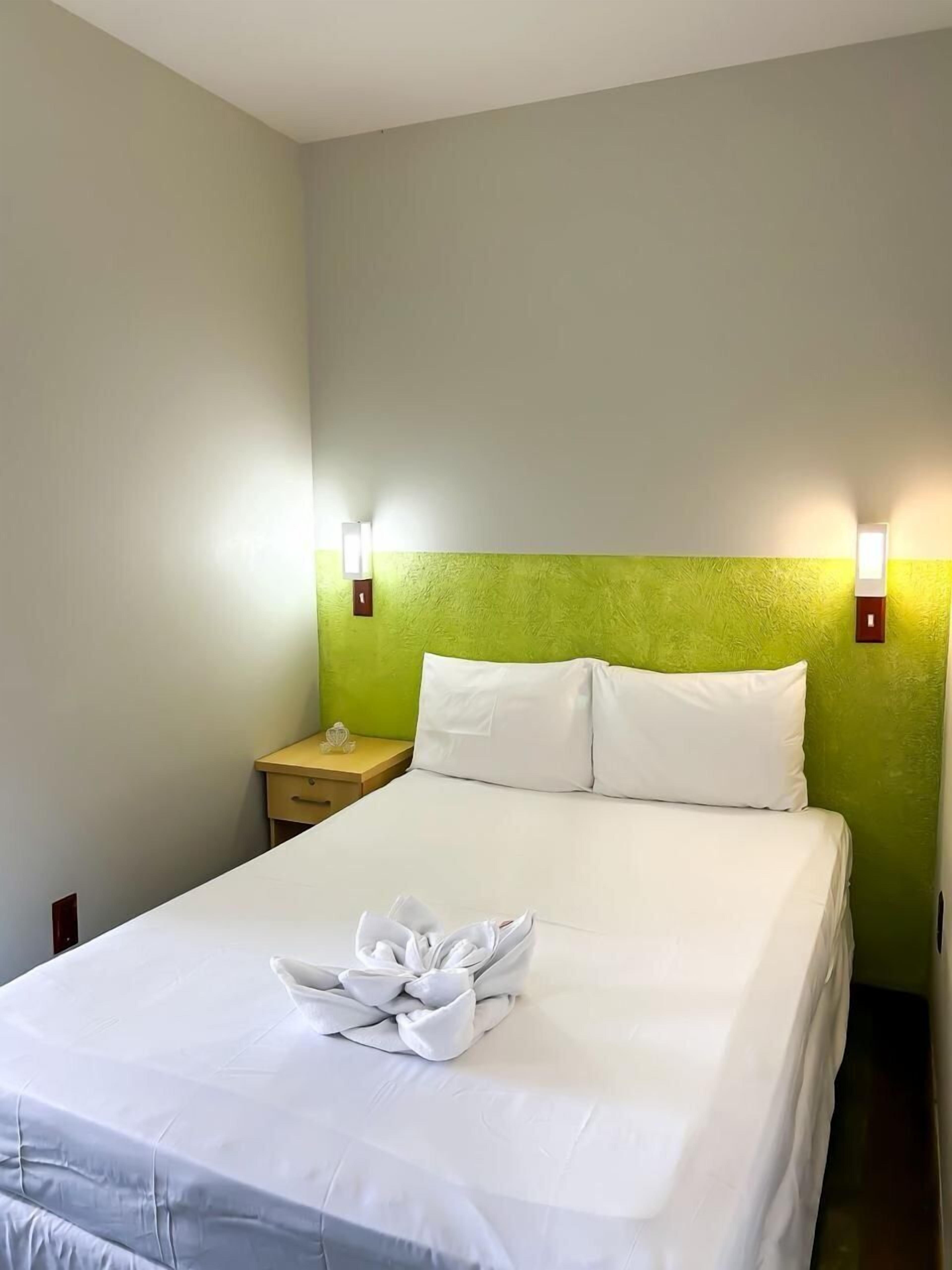 Suite | Minibar, cortinas blackout, tabla de planchar con plancha y wifi gratis 