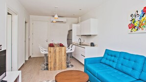 Penthouse, 2 Bedrooms | Living area | 32-inch flat-screen TV with cable channels, TV - Koox Moma 42 Condhotel (Playa del Carmen)