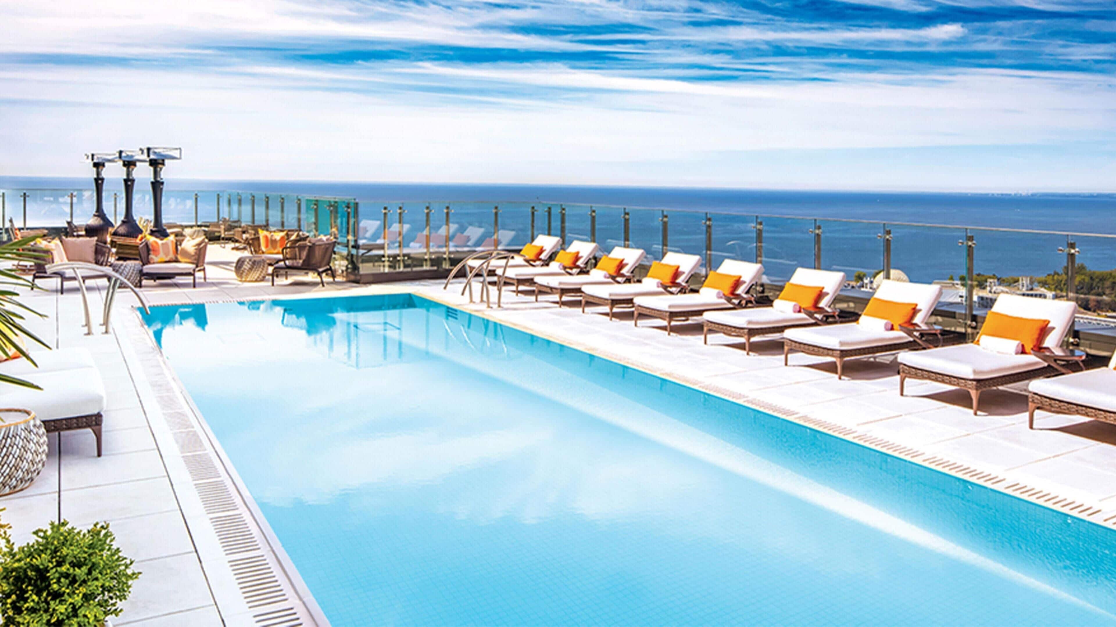 Outdoor pool, a heated pool, open 7:00 AM to 11:00 PM, sun loungers