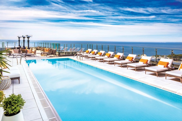 Outdoor pool, a heated pool, open 7:00 AM to 11:00 PM, sun loungers