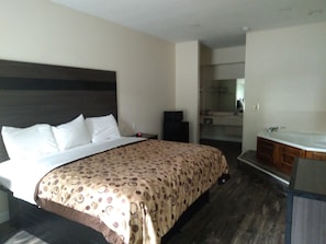 Superior Room, 1 King Bed, Non Smoking, Jetted Tub | Laptop workspace, blackout drapes, iron/ironing board, free WiFi