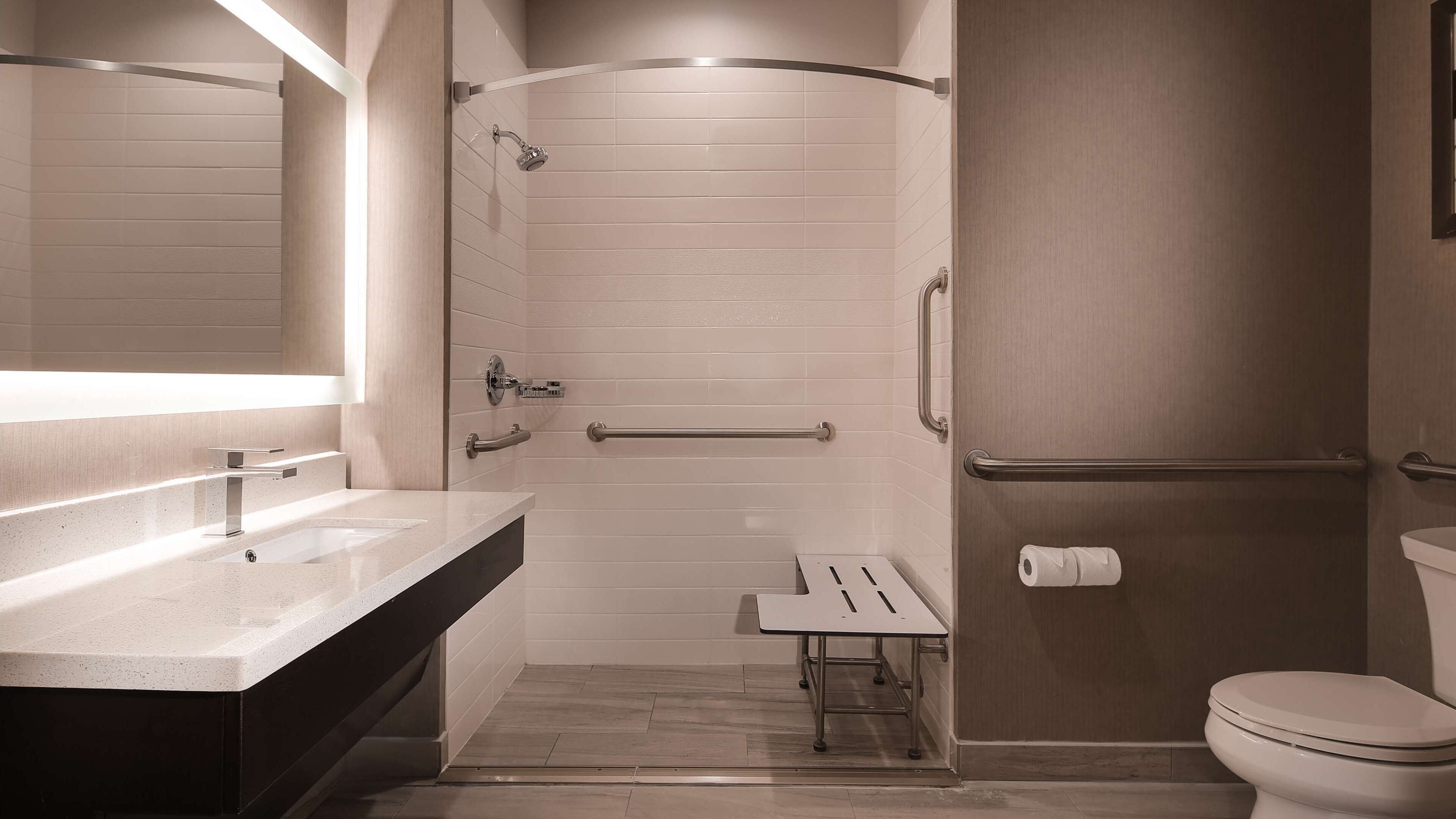 suite, 1 king bed with sofa bed, accessible, kitchenette (with sofabed) | bathroom | free toiletries, hair dryer, towels