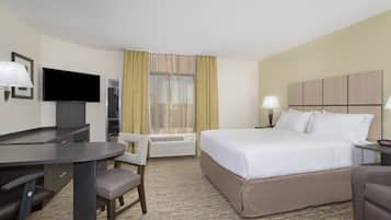 Hypo-allergenic bedding, desk, laptop workspace, blackout curtains