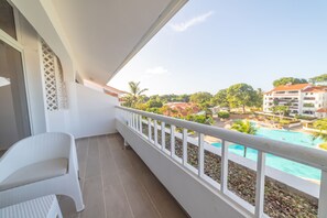 Outdoor pool, open 8 AM to 10 PM, pool umbrellas, sun loungers