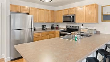 Condo, 2 Bedrooms | Private kitchen | Full-sized fridge, microwave, oven, stovetop