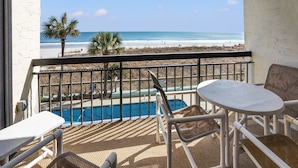 A balcony with a view of the beach and a pool. - Shoreham Towers 2D by RedAwning (North Myrtle Beach)