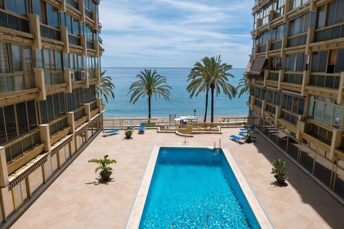 Beachfront Condo in Marbella Center with 2 Pools & Parking