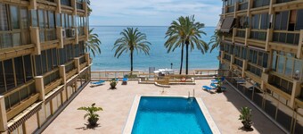 Beachfront Condo in Marbella Center with 2 Pools & Parking
