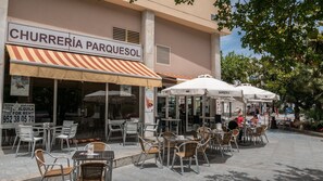 Outdoor dining - Beachfront Condo in Marbella Center with 2 Pools & Parking (Marbella)