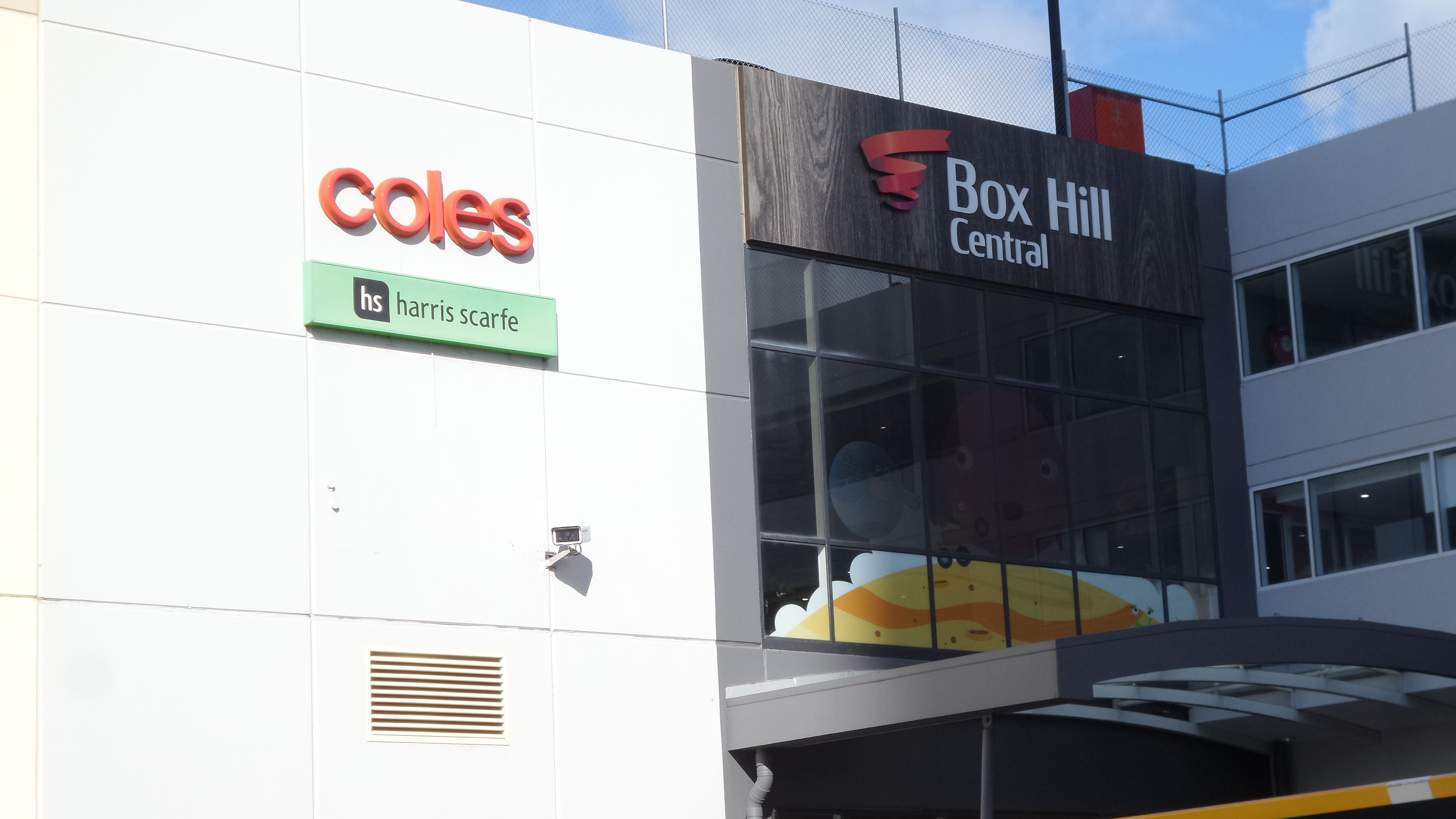 A building with signs for 'Coles' and 'Box Hill Central'.