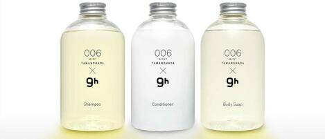 Three bottles of 006 mint Tamanohada shampoo, conditioner, and body soap.