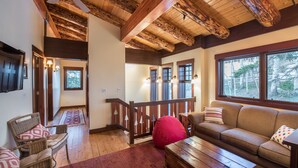 Flat-screen TV, fireplace, pay movies