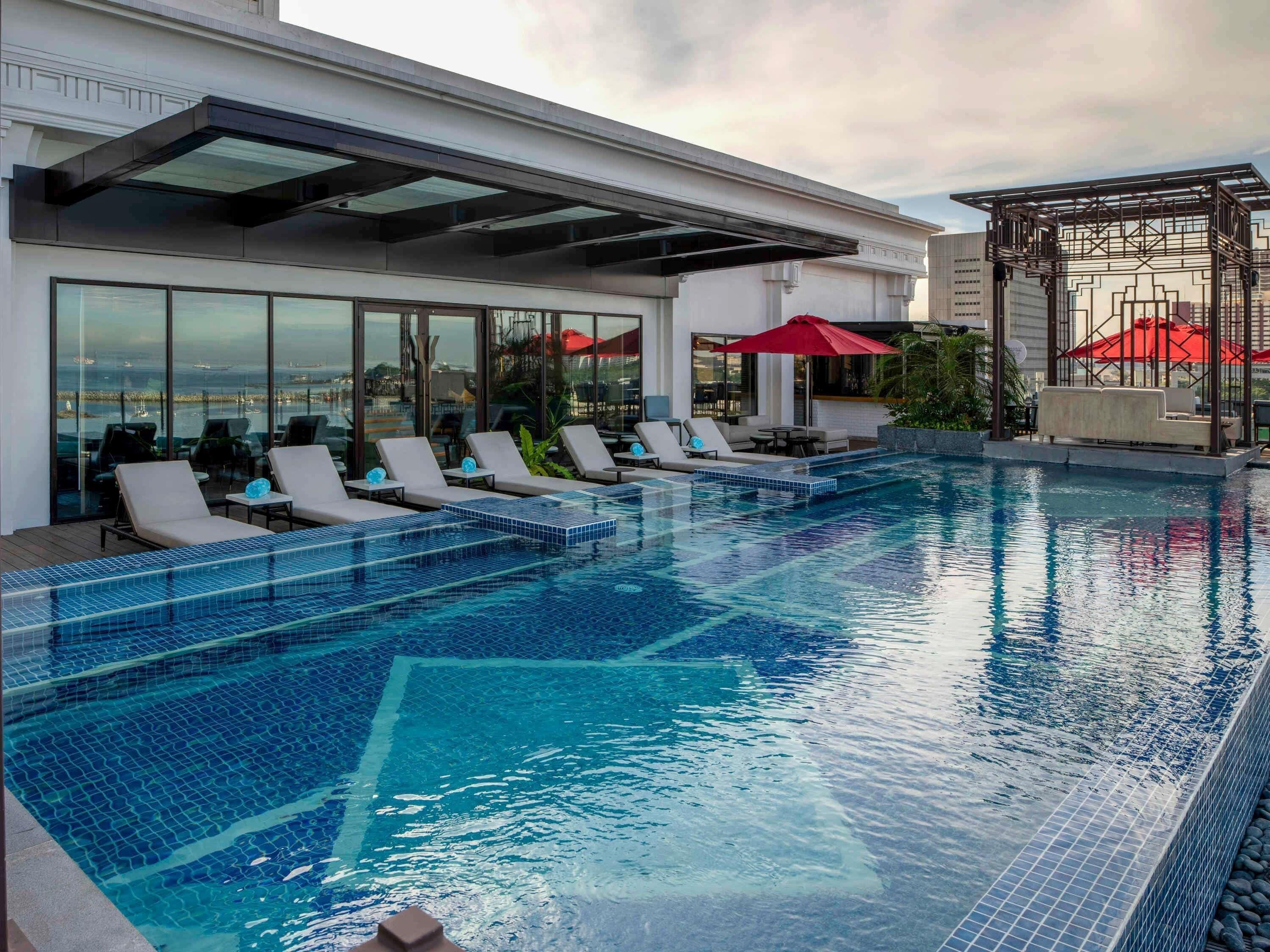 Outdoor pool, open 7:00 AM to 7:00 PM, sun loungers