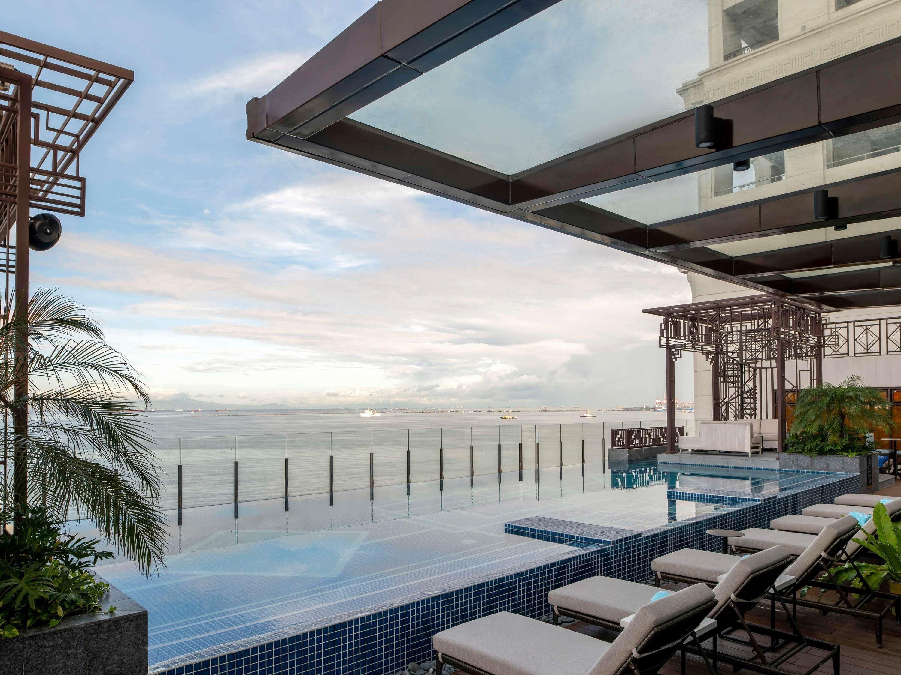 Outdoor pool, open 7:00 AM to 7:00 PM, sun loungers