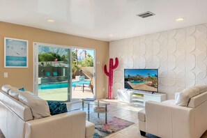 Smart TV, fireplace, books, music library