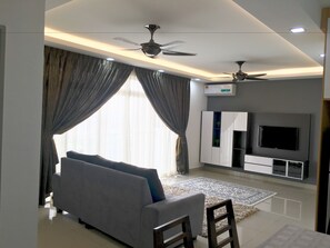 Family Apartment, 3 Bedrooms, Pool View | Living room | LCD TV - Glamora Putrajaya Homestay (Putrajaya)