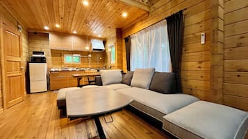 Two-Bedroom House | Living area | Flat-screen TV