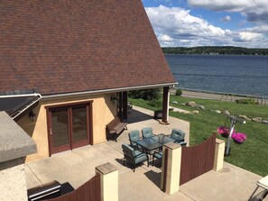 Outdoor dining - Huge Lakefront A-frame on Owasco, 4 king bedrooms, 5 bathrooms, Sleeps 10-12 (Auburn)