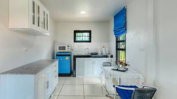 Villa One Bedroom | Private kitchen | Full-sized fridge, microwave, oven, stovetop