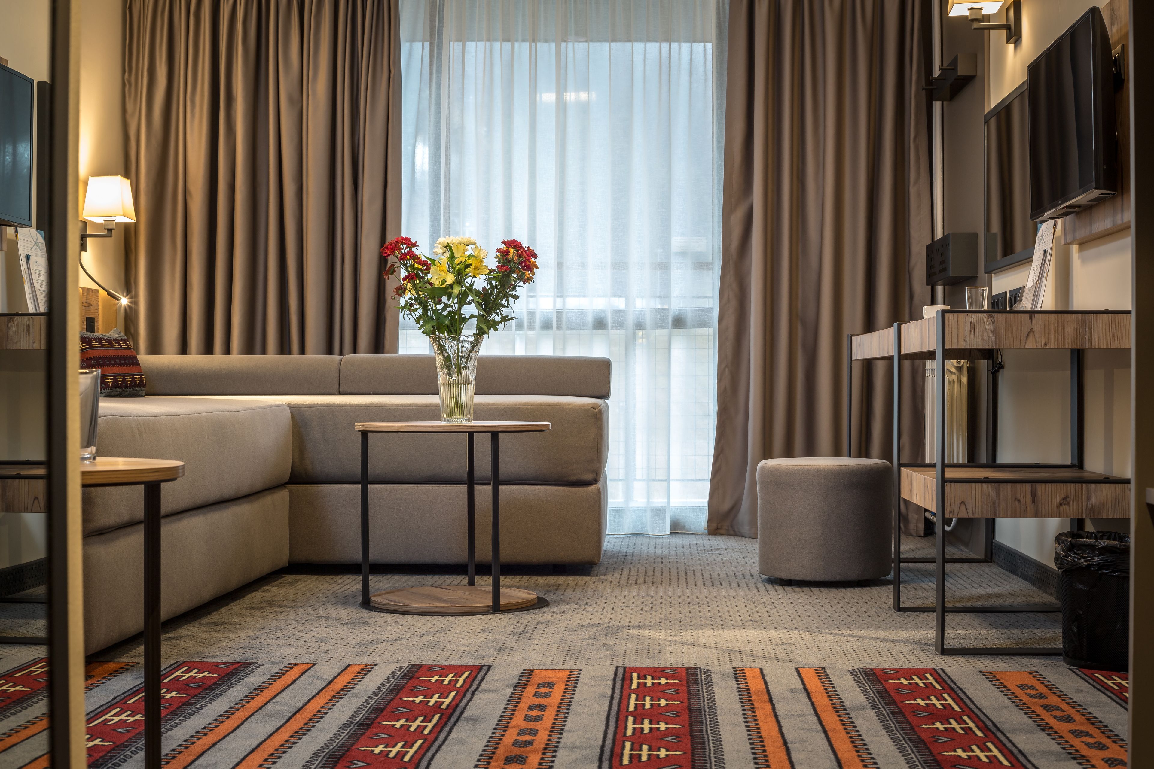 desk, blackout curtains, soundproofing, free cots/infant beds